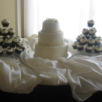 Ivory Wedding Cake And Cupcakes 