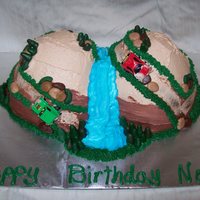 Mountain Racing Mountains made from 2 doll pans and covered in buttercream.