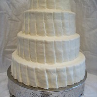 Ivory 4 tier wedding cake in Ivory buttercream