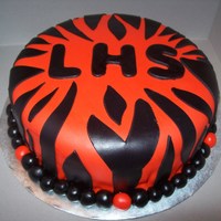 Go Tigers I made this cake for a mixer for the high school that I graduated from. Our mascot was tigers.