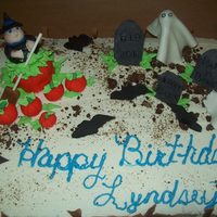 Halloween half choc half white buttercream fondant witch . pumpkins. ghost and gravestones