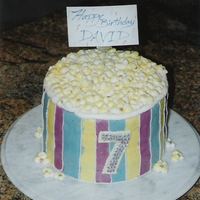 Popcorn One of my early cakes. Alternating colors of green and blue cake, filled and frosted with CC frosting. The popcorn is CC frosting as well,...