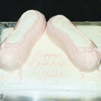 Ballet Shoes White (or yellow...can't remember) cake filled, frosted, and decorated with CC frosting. Size 7 because she was turning 7 years old!