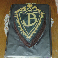 Jonas Brothers! Chocolate cake filled, frosted, and decorated with CC frosting. Sides are covered with grated dark chocolate. My daughter LOVES the Jonas...