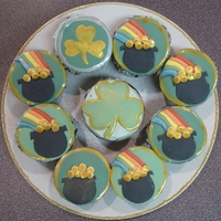 St. Patty's Day This is my first attempt at making cuppies with fondant decor. They are chocolate with mint BC. I used a washed pen top to cut out the...