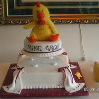 Chicken Cake I made this for our school principal's retirement. I covered it with fondant and had guests sign the fondant using food grade markers...