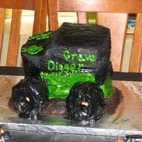 Grave Digger Not one of my better cakes. The homemade frosting was not cooperating!