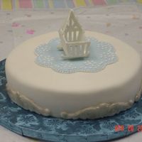 Baby Shower I made this cake for a co-worker's baby shower. Chocolate cake covered with fondant. Cradle is made of royal icing