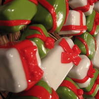 Christmas Gifts Small cakes "wrapped" in fondant.