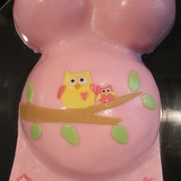 Baby Bump Baby bump cake made with the Wilton ball pan and mini wonder mold pans. The owls are inspired by the nursery decor the mom-to-be picked out...