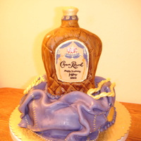 Crown Royal Bottle for my stepson's 25th Birthday. First time trying to carve a cake.