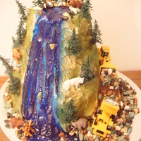 Outdoors Cake Husband is a hunter/fisherman and Father-in-law and Brother-in-law build roads, so tried to incorporate all three into a shared birthday...