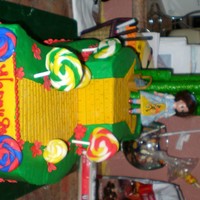 Wizard Of Oz Cake A Wizard of Oz themed cake for my manager's son Jakob. He was a munchkin and a flying monkey over the summer.2 layer chocolate cake on...