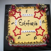 Estefania Made this cake for the sister of the purple cake (Cecilia). She wanted a yellow cake with High School Musical-like colors. This was my...