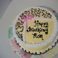 Mom's Cake Made this for my mom's birthday. She adores the color yellow. She loved her surprise cake.
