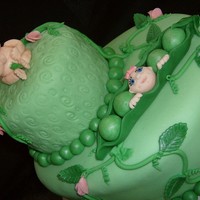 Sweet Pea The extra small cake on top is supposed to be saved for the babies 1st birthday much like the top tier of a wedding cake is for the 1st...