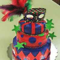 Sweet 16 Mardi Gras All 3 tiers are 2 layer white cakes with fresh strawberry filling. Iced in home made sweet cream cheese. Marshmallow fondant accents. Hand...