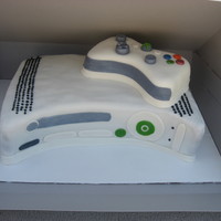 Xbox 360 Grooms Cake Chocolate cherry brownie cake. Chocolate cake with cherries baked in. Dense, brownie like cake. Iced with chocolate buttercream, covered in...