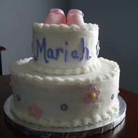 Purple & Pink Baby Shower Cake All buttercream with fondant shoes on top.