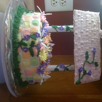 Wishing Well Just testing out my new skills after taking 2 cake classes. The cake is iced with buttercream, all the flowers are made out of royal icing...