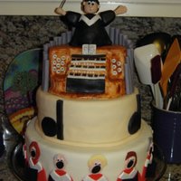 Choir Director Farewell made for the farewell dinner for our church's music director. GP organ pipes & figure, everything else is fondant.