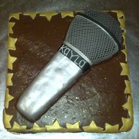 Microphone fondant covered sculpted microphone on chocolate BC, fondant star cut-outs