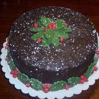 Snowy Holly dark chocolate ganache, MMF holly berries & leaves. I decided after taking this picture that I had too much PS 'snow,' so I...