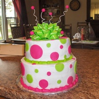 Green & Pink Polta Dots White buttercream, Fondant dots. Fake bow. Fondant balls on wire.