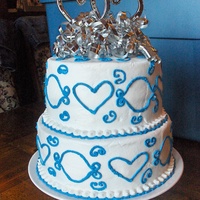 Hearts Of Love All buttercream. This was for a bridal shower. Her colors were Royal Blue and Silver.