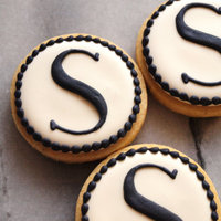 Mini Monograms 2-1/2" round cookies decorated in black and white