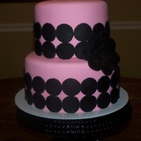 18Th Birthday Cake Two tier cake fondant covered with fondant flower and and polka dots.