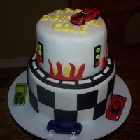 Boys Birthday Cake Fondant covered cake with all fondant decor. on it.