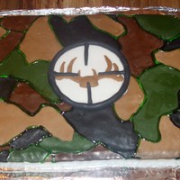 Deer Hunter's Camo Cake This cake was made for my grandfather in law's birthday. Camo & deer head is made out of fondant.