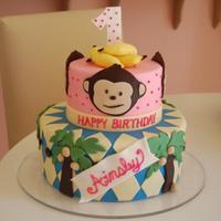 Monkey Birthday Cake! This cake was inspired by the cups and plates the mommy picked for the party. It had a really cute monkey that I copied in fondant and...