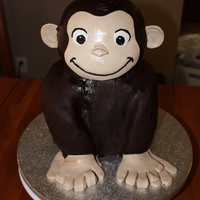 Curious George not my best cake, but I learned a lot. The whole body is chocolate truffle cake, alternating 6 layers of raspberry filling and choc...