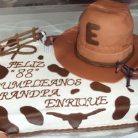 Western Cake Buttercream with fondant accent. 3D Cowboy Hat.