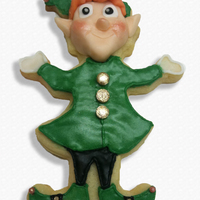 Elf Christmas Cookie Elf glazed cookie with modeling chocolate face.