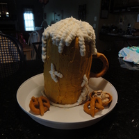 Fathers Day Cheers!! Made this for fathers day. Mug of beer served on a beer tray with pretzels and pistachios!! 4- 6 inch cakes. Candy clay pretzels, handle,...