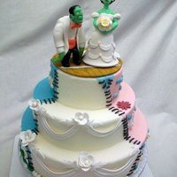 Bride Of Frankenstein Wedding Cake The cake is decorated to look like a Frankensteinian combination of a wedding cake, a birthday cake, and a flowery spring cake. The topper...