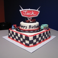 Cars Themed Cake This was so much fun to make for our little friend, Jack, who just turned 4! It is chocolate cake with cream cheese frosting and fondant...