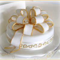 Anniversary Replica This anniversary cake was made to replicate the top tier of this couples wedding cake :) It is a 9 inch caramel mud cake with caramel...