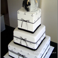 Kirsty Congratulations Kirsty and Stu. This wedding cake has 11", 8" and 5" double height square tiers. The bottom two tiers are...