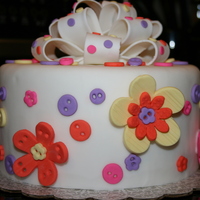 Flowers & Buttons Oh My! Practice cake for a Wilton Instructors training seminar...so much fun!