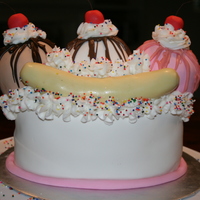 Banana Split Sundae Cake My second attempt at 3D style cakes...and what a blast to make! All cake except for the cherries which are straight fondant (colored...