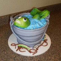 Fish Bucket Cake mmf covered 8", 9", 10" white cakes with buttercream frosting, fondant fish, lures, and worms. airbrushed for dimension and...