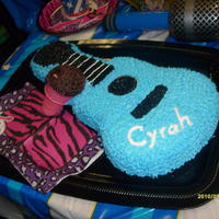 Guitar Cake With Microphone This is the first cake I've ever decorated. The cake was for my daughter's 5th birthday party- Rockstar Theme. The "...