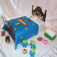 Toy Story Everything is edible except for Buzz and Woody. I made my own template for the head and foot board. I used some of the cake photos from...