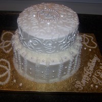 Diamonds And Pearl Cake Diamonds and Pearls Cake: 2-tier stacked construction, with Amaretto Almond Buttercream Filling. Complete with Scrollwork and Edible...