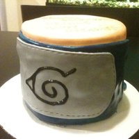 Naruto Birthday Orange and Blue MMF fondant-- fresh mango puree pound cake with whipped cream and fresh mango and mango pudding filling; three layers of...