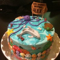 Sea Animals Three-layer Red Velvet Cake with Cream-cheese frosting-- fondant and frosting outside, gumpaste and fondant sea-creatures, candy coated...